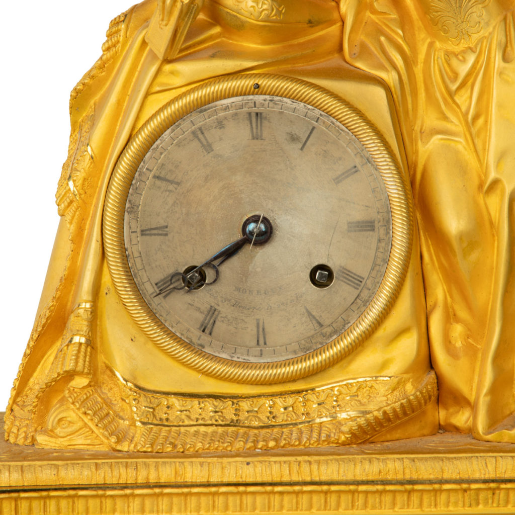 An ormolu mantel clock with Queen Victoria in medieval dress, by ...