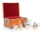 Victorian silver tea and coffee box open with silver