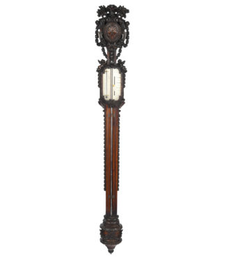 Lord Vernon’s Sudbury Hall lime wood barometer, by J. Braund after Grinling Gibbons