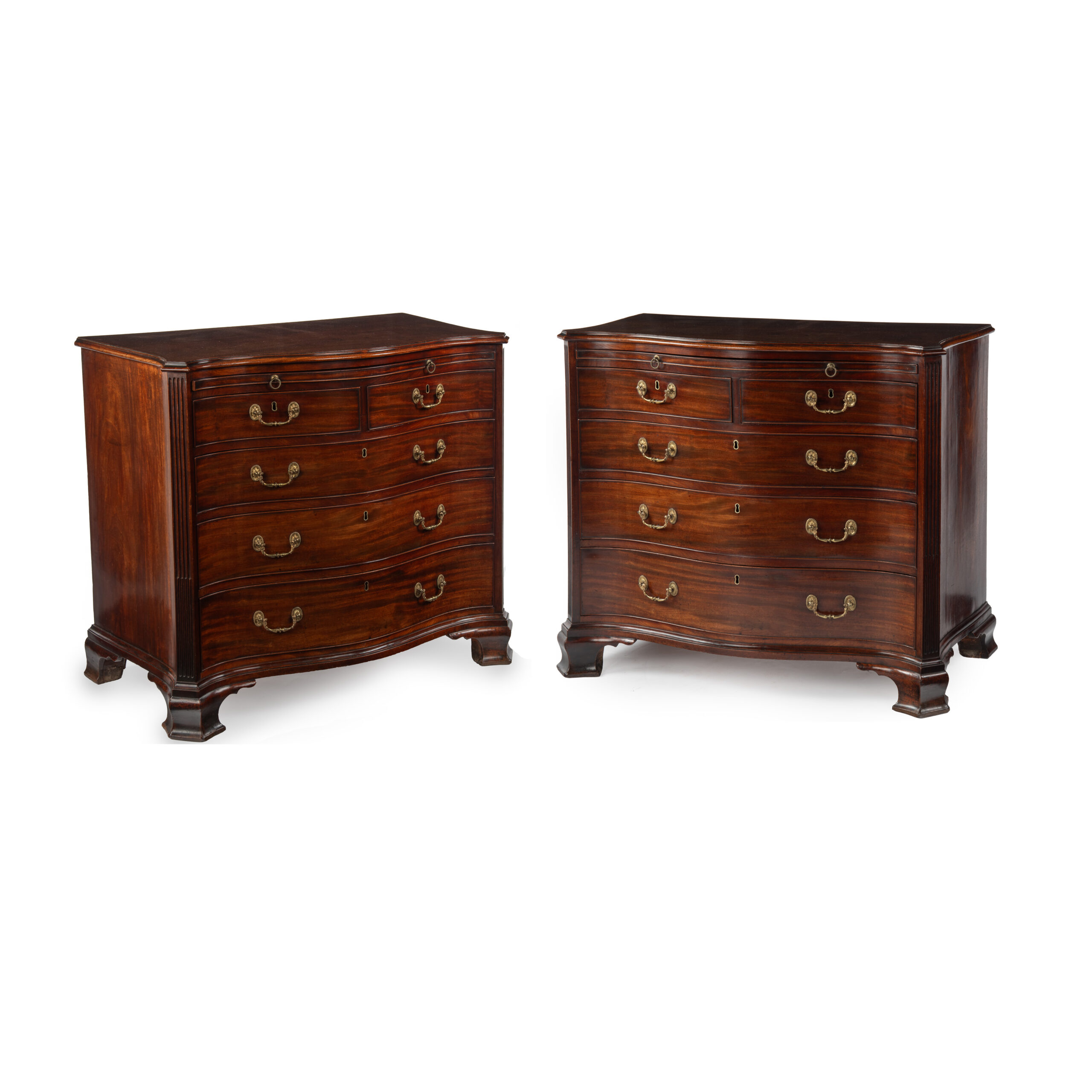 An Extremely Fine Pair of George III Period Mahogany Serpentine Chests of Drawers/Commodes with Stop Fluted Angles c.1765