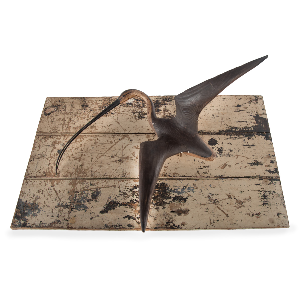 A Wall-mounted Sculpture of a Curlew, Carved and Painted, Mounted on a Painted Panel, by Guy Taplin (B.1939)